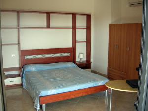 A bed or beds in a room at Donizetti Apartment 5