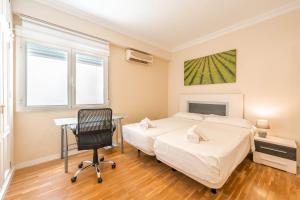 Posteľ alebo postele v izbe v ubytovaní Gran apartamento de 3 habitaciones junto a la Catedral