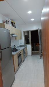 Een keuken of kitchenette bij Appartement Costa Bouznika