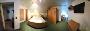 Кровать или кровати в номере Erd´s Hoimatle