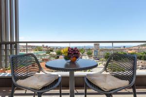 Rõdu või terrass majutusasutuses Nest Apartment