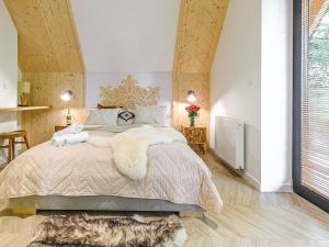 Posteľ alebo postele v izbe v ubytovaní VisitZakopane - Lizbona Apartment