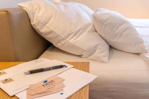 Voodi või voodid majutusasutuse Nest Apartment toas