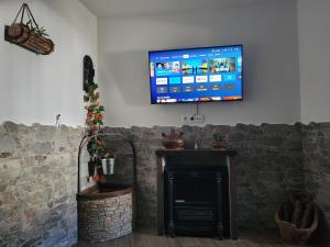 TV a/nebo společenská místnost v ubytování Casita zamudio