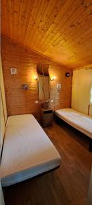 Postel nebo postele na pokoji v ubytování CHALET 35m2 climatisé 2 chambres vue mer