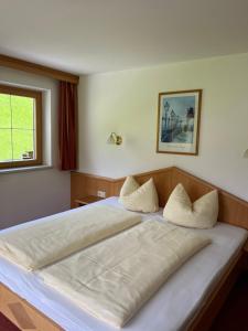 Cama o camas de una habitación en Gasthof Gradlspitz