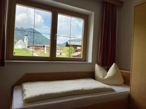 Cama o camas de una habitación en Gasthof Gradlspitz