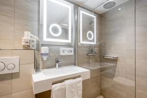 Koupelna v ubytování Apart Hotel Garni Wieser