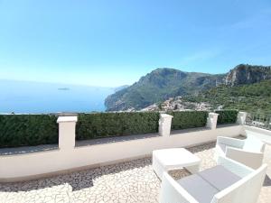 a balcony with a view of the ocean at Casa Vacanze Agape in Positano