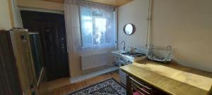 Kuchyň nebo kuchyňský kout v ubytování Quest home + 1 fotografie