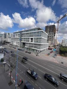 a busy city street with cars driving on a road at Appartement Boulevard d’Anfa! in Casablanca