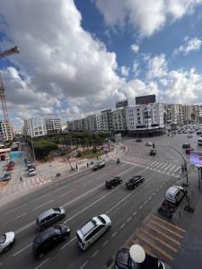 a busy city street with cars on the road at Appartement Boulevard d’Anfa! in Casablanca