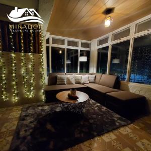 A seating area at Mirador Old-Time House walking distance to Lourdes Grotto