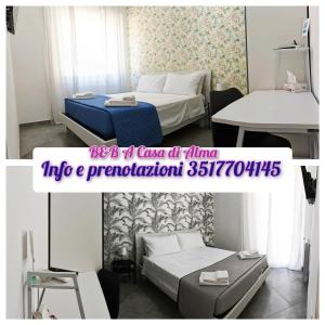 - une chambre avec un lit, une table, un lit et un bureau dans l'établissement A casa di Alma, à Terni