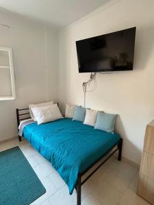 Postel nebo postele na pokoji v ubytování Elenis Studio Corfu Town