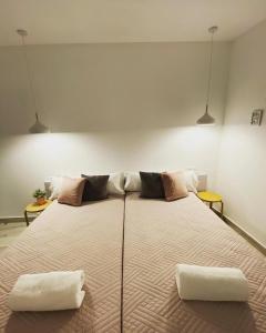 A bed or beds in a room at La Casita M&S