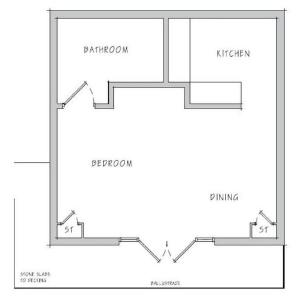 una disposizione a pavimento di un bagno con diagramma di Fantastic Cotswolds hideaway Cleeve Hill a Southam