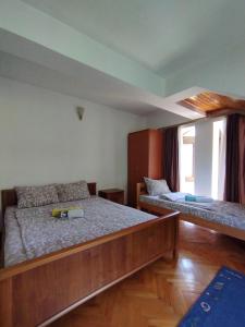 Postel nebo postele na pokoji v ubytování VILA MARKO