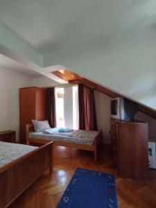 Postel nebo postele na pokoji v ubytování VILA MARKO