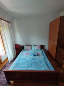 Postel nebo postele na pokoji v ubytování VILA MARKO