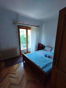 Postel nebo postele na pokoji v ubytování VILA MARKO