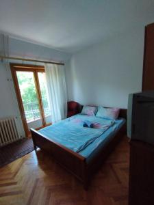 Postel nebo postele na pokoji v ubytování VILA MARKO