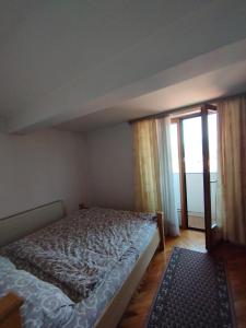 Postel nebo postele na pokoji v ubytování VILA MARKO