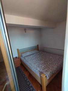 Postel nebo postele na pokoji v ubytování VILA MARKO