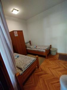 Postel nebo postele na pokoji v ubytování VILA MARKO