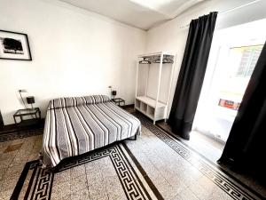A bed or beds in a room at I Ninni