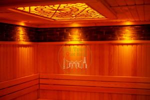 a room with a ceiling with a light on it at Old Town Point Hotel & Spa Antalya in Antalya