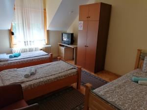 Postel nebo postele na pokoji v ubytování VILA MARKO