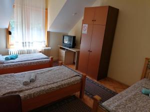 Postel nebo postele na pokoji v ubytování VILA MARKO