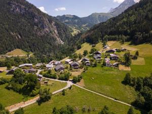 an aerial view of a village in the mountains at chalet du Champel jacuzzi in Saint-Gervais-les-Bains