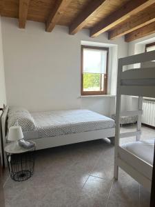 Postel nebo postele na pokoji v ubytování Casa Matilde - Residence Cà Vecchia