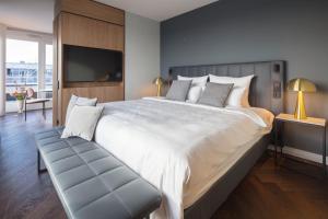 Postel nebo postele na pokoji v ubytování SOLLER Business Hotel - Munich Airport MUC + 37 fotografií