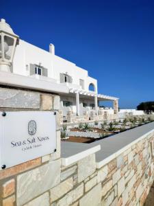 a sign for the sea s salt knolls villa at Sea and Salt Naxos 3 in Kastraki