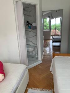 Postel nebo postele na pokoji v ubytování Guest House Villa Kosa