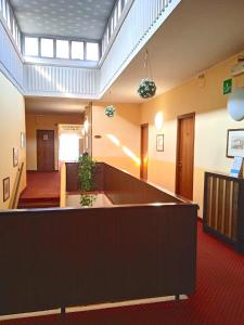 a lobby of a hospital with a reception desk at Hotel Parco Fiera in Turin