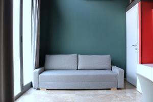 Un lugar para sentarse en Michelangelo Navigli Loft Experience - Via Magolfa