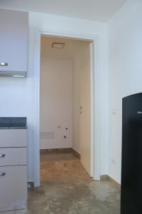 Una cocina o kitchenette en Michelangelo Navigli Loft Experience - Via Magolfa