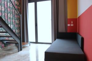 Una cama o camas en una habitación de Michelangelo Navigli Loft Experience - Via Magolfa