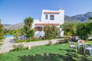 a villa with a view of the house at Plakias Villas in Lefkogeia