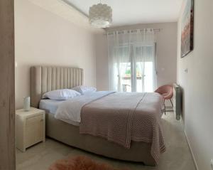 Postel nebo postele na pokoji v ubytování Apartman Get Rest