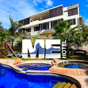 a building with a swimming pool in front of a building at ME Hotel & Villas - Montañita Estates in Montañita