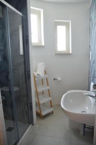 Kúpeľňa v ubytovaní Appartamenti La Baia del Raìs