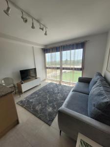 Posezení v ubytování Apartamento duplex Mediterránean view