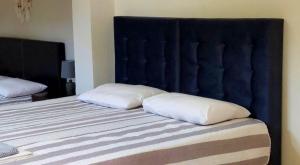 Posteľ alebo postele v izbe v ubytovaní Villa Anna Maria