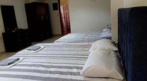 Posteľ alebo postele v izbe v ubytovaní Villa Anna Maria