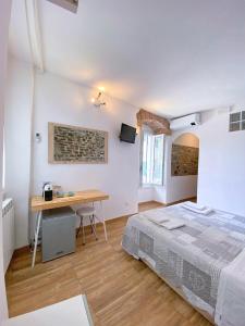 Postel nebo postele na pokoji v ubytování Double room "Malvasia" - Casedirio